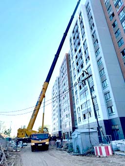 Автокран 100 тонн в аренду на строительсву высотного дома